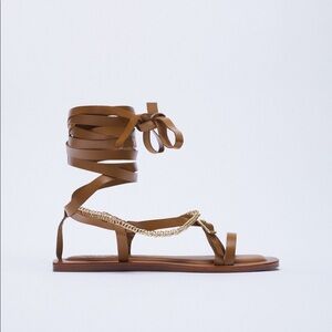 NWT. Zara Brown Tied Leather Flat Sandals with Chain. Size 6,5.